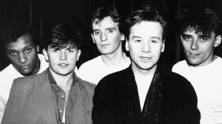 Simple Minds posing for a photograph in the mid-80s