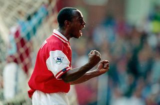 Ian Wright celebrates a goal for Arsenal against Aston Villa in September 1996.