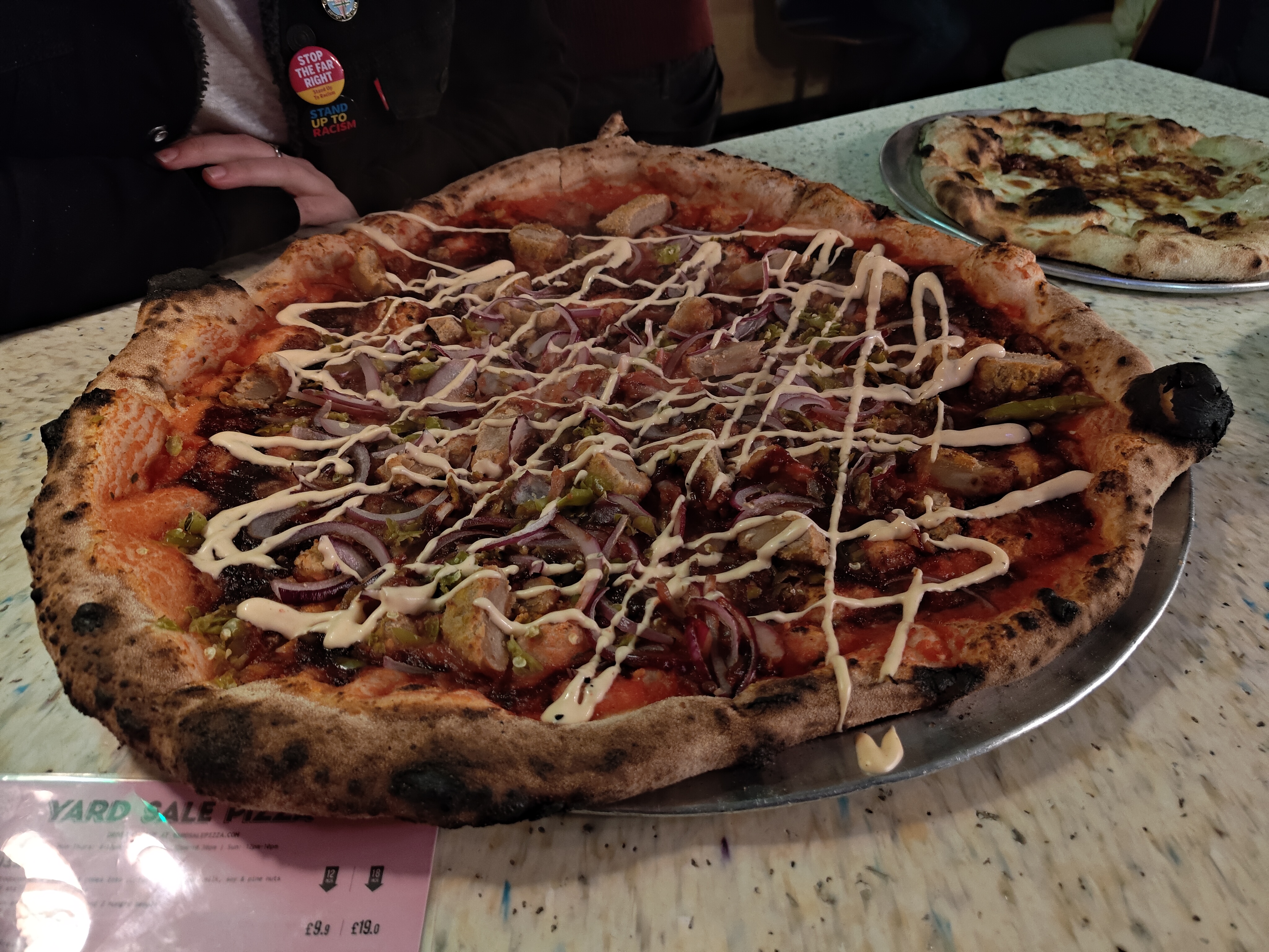 A camera sample captured on the Asus Zenfone 12 Ultra showing a pizza.