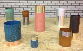Containers in various colors, with golden and silver details.