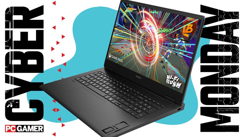 A HP laptop on a blue Cyber Monday background.