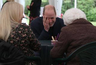 Prince William blushes with embarrassment