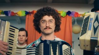 Daniel Radcliffe dramatically surrounded by accordions in Weird: The Al Yankovic Story.