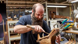 Neck profiles are shaped the old-fashioned way - by hand and eye - in Martin’s Custom Shop
