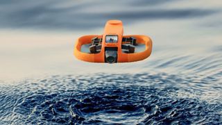 HoverAir Aqua drone flying above water