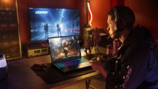 A gamer playing a PC game on an Acer laptop