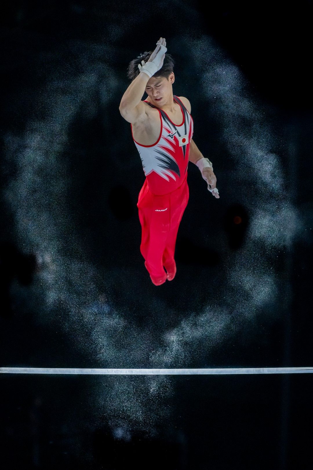  22 year old Japanese gymnast Daiki Hashimoto on the bar during the 2023 World Championships 