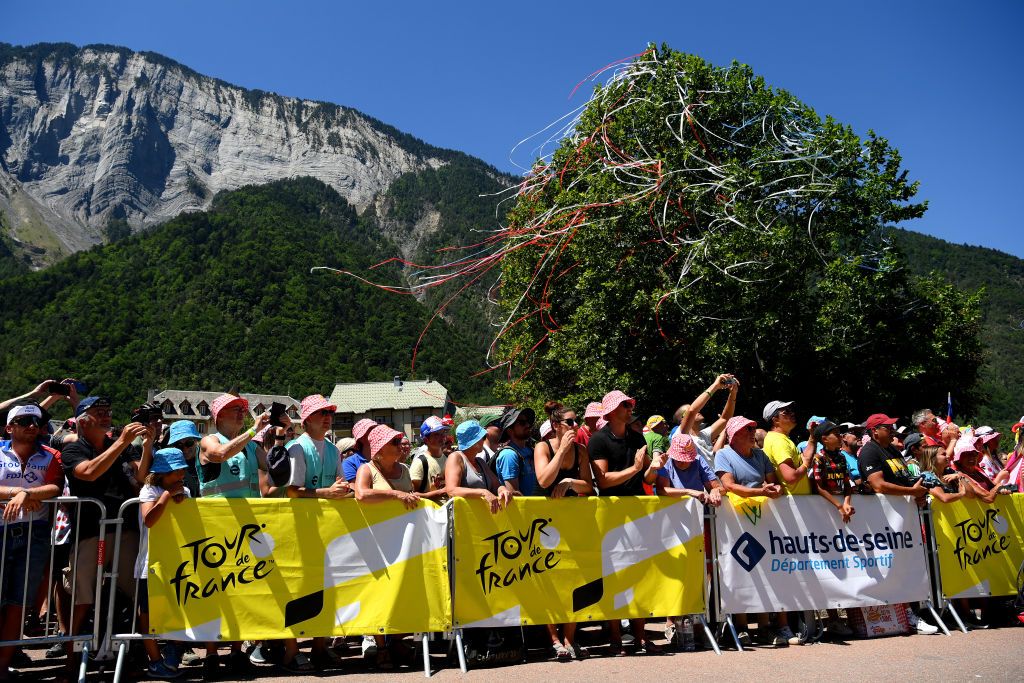SAINTETIENNE FRANCE JULY 15 Fans cheer prior to the 109th Tour de France 2022 Stage 13 a 1926km stage from Le Bourg dOisans to SaintEtienne 488m TDF2022 WorldTour on July 15 2022 in SaintEtienne France Photo by Alex BroadwayGetty Images
