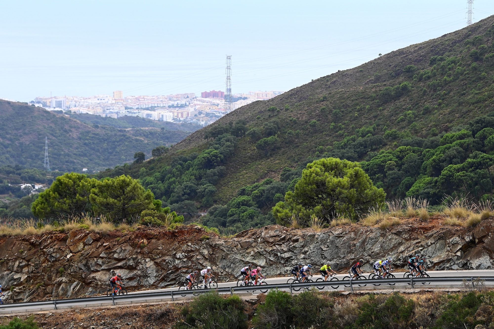 Riders in a breakaway climb to the Pe&ntilde;as Blancas, above the Mediterranean, in 2022