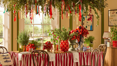 Next x Lia Gold collection tablescape with red striped covering and tomato decor