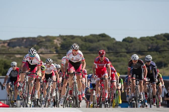 Sean Mazich leads the Jelly Belly squad and the rest of the field over the top of the hill on final lap after Jelly Belly director Danny Van Haute emphatically shouted directions to his riders in the closing laps.