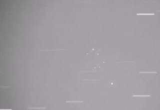 Video still image of United States secret satellite DSP-F23 as the satellite approached the ASTRA 1 constellation group.