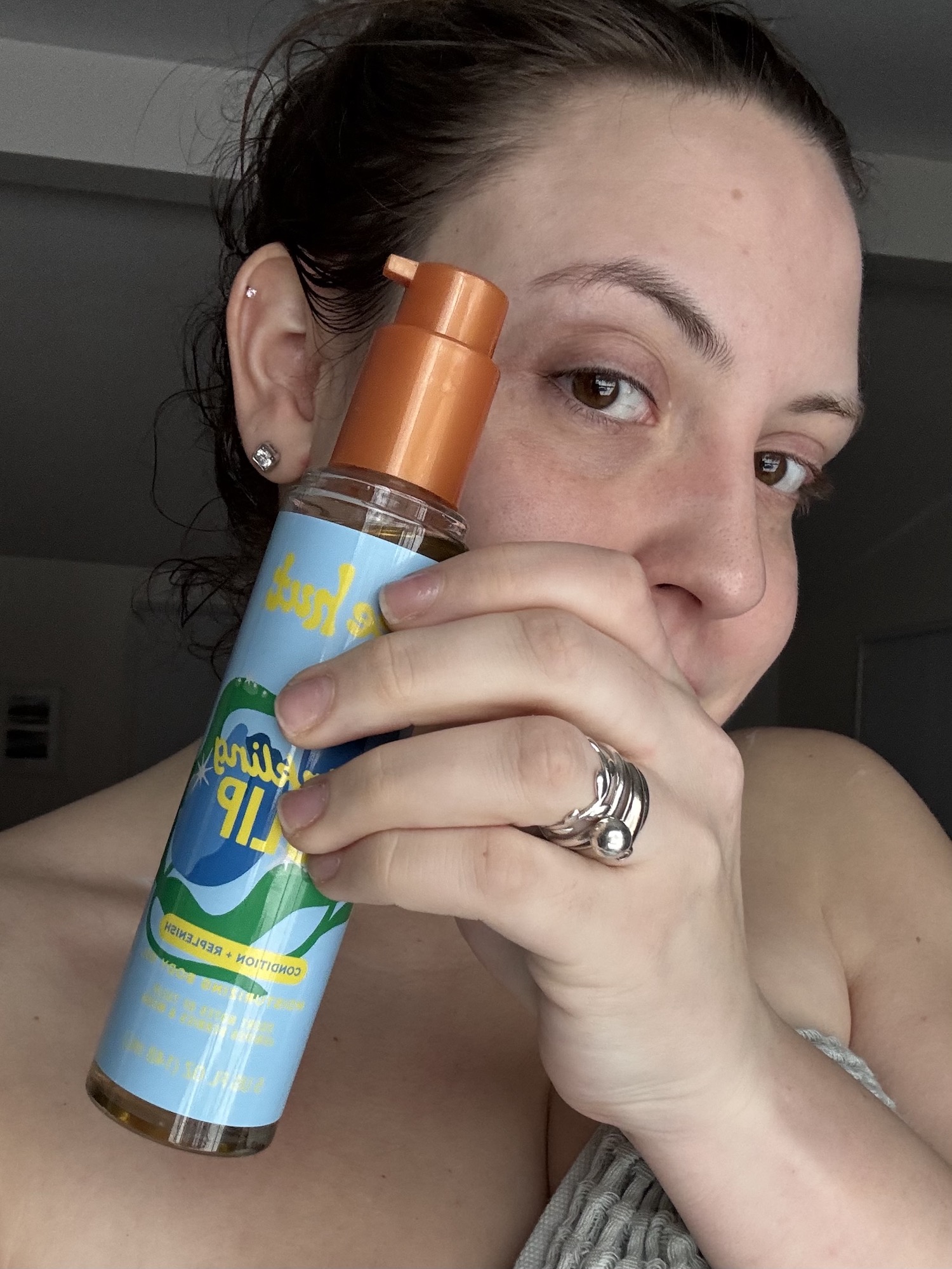 Sophia Vilensky testing Tree Hut's Twinkling Tulip Oil.