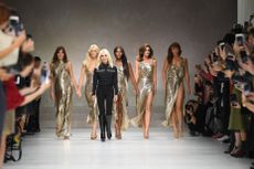 Donatella Versace on runway leaving Versace