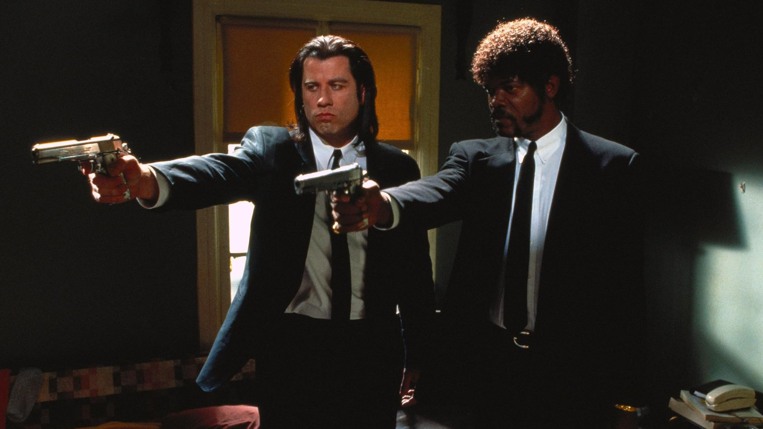 John Travolta as Vincent Vega and Samuel L Jackson as Jules Winfield in Pulp Fiction