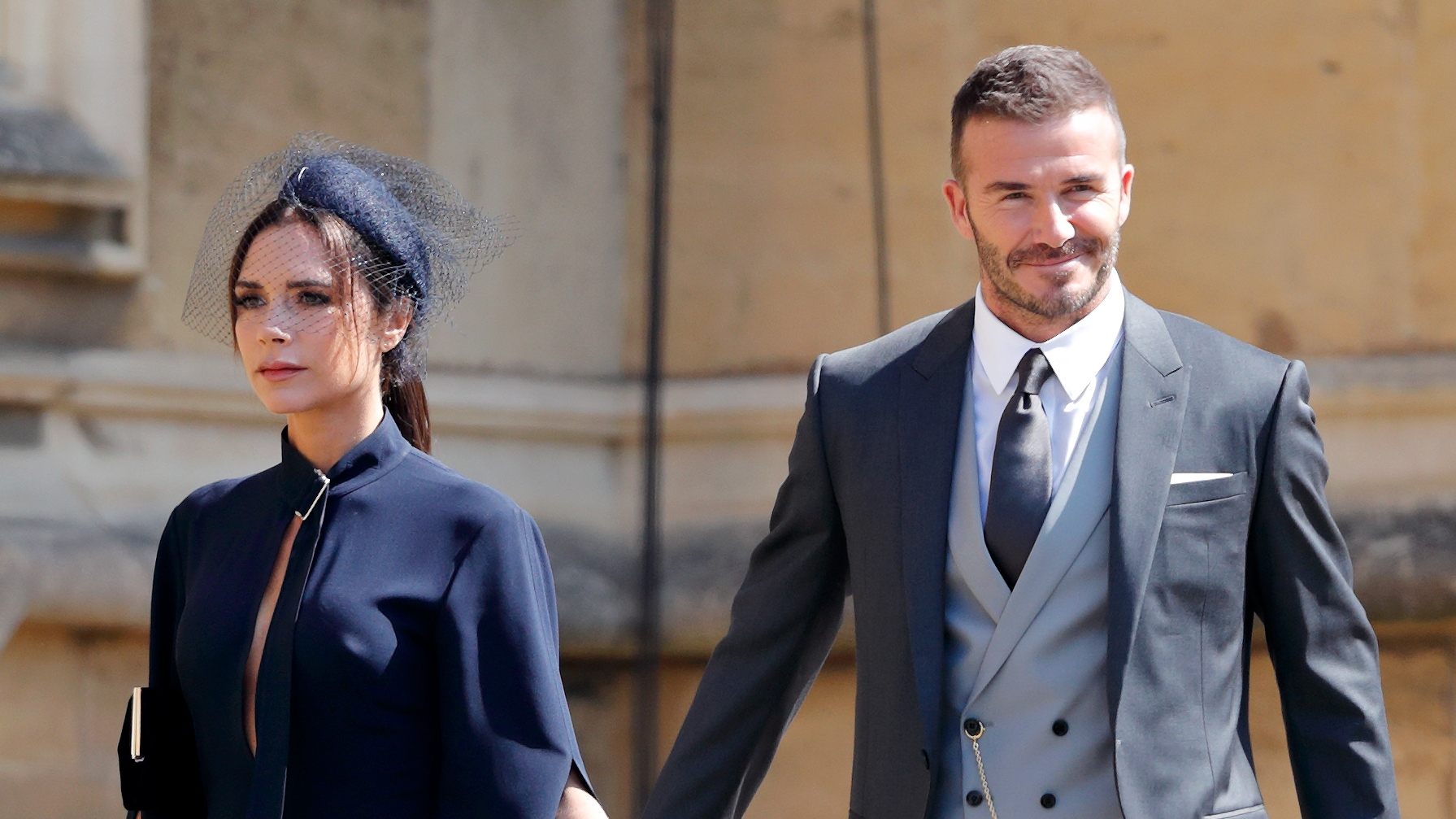 Victoria Beckham and David Beckham arrive to attend the wedding of Prince Harry to Meghan Markle at St George's Chapel