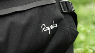 Closeup of fabric and logo on Rapha Trail Hip Pack