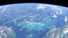 A photo of the ocean around the Bahamas taken from space