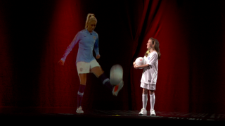Vodafone made the first love holographic phone call over 5G in late 2018 between England / Man City FC captain Steph Houghton MBE and young fan Iris (Image credit: Chris Ison/AP Images for Vodafone)