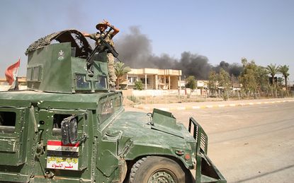 A member of the Iraqi government forces in Fallujah.