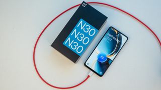 Charging a OnePlus Nord N30 5G with the red cable