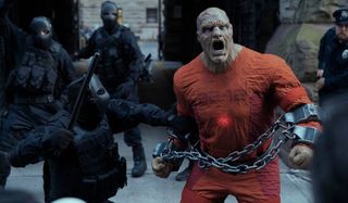 Monster-like guy screaming in chains Jupiter's Legacy Netflix
