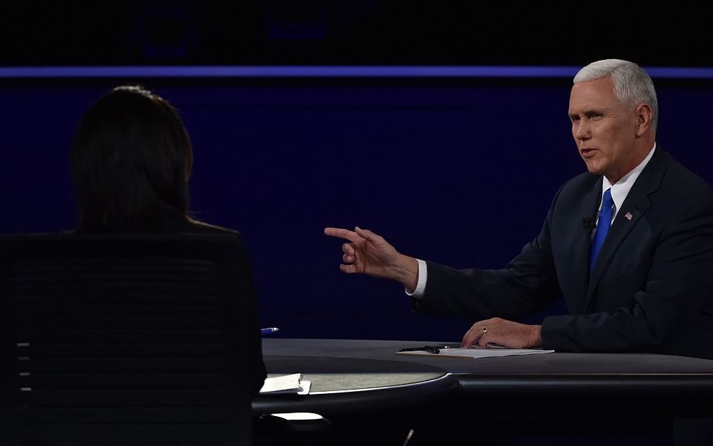 Mike Pence points at Tim Kaine