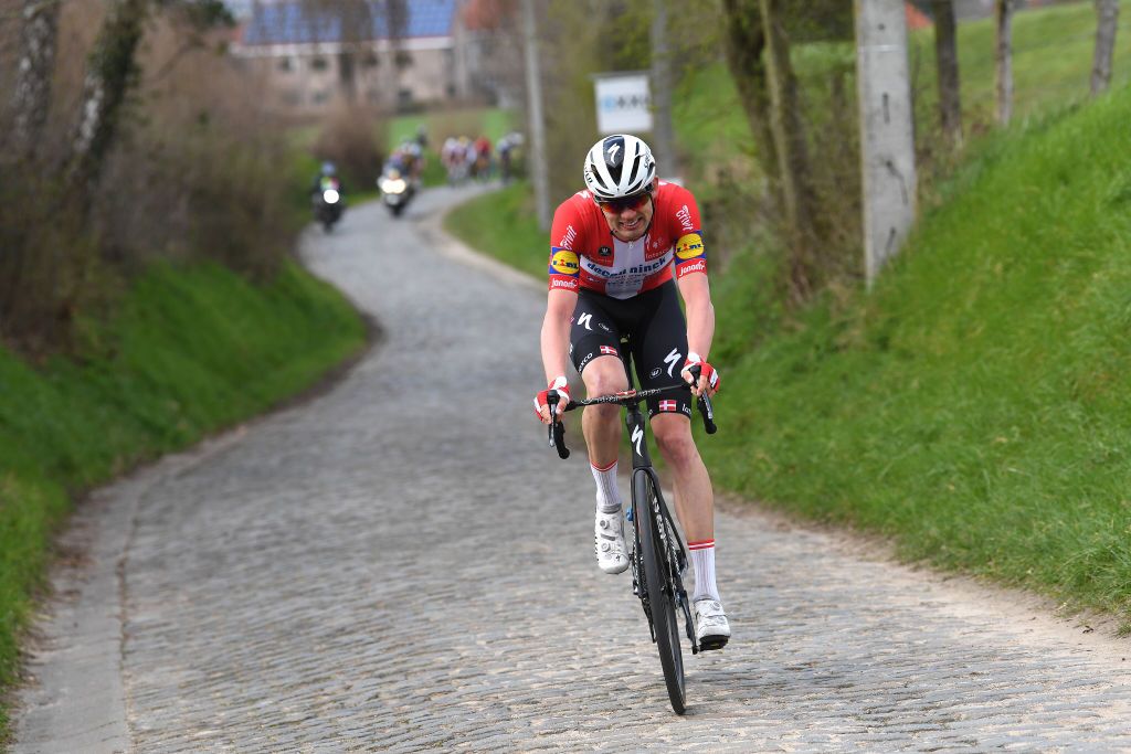 HARELBEKE BELGIUM MARCH 26 Kasper Asgreen of Denmark and Team Deceuninck QuickStep at Oude Kwaremont during the 64th E3 Saxo Bank Classic 2021 a 2039km race from Harelbeke to Harelbeke Breakaway Cobblestones E3SaxobankClassic on March 26 2021 in Harelbeke Belgium Photo by Tim de WaeleGetty Images