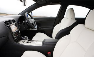 Inside the cabin the tried and tested Lexus design language is displayed in carbon fibre, perforated leather and aluminium varied finishes