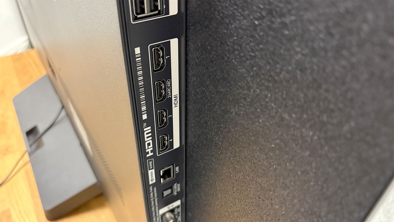 A close-up of the connections on the side of an LG C5 55-inch OLED TV.