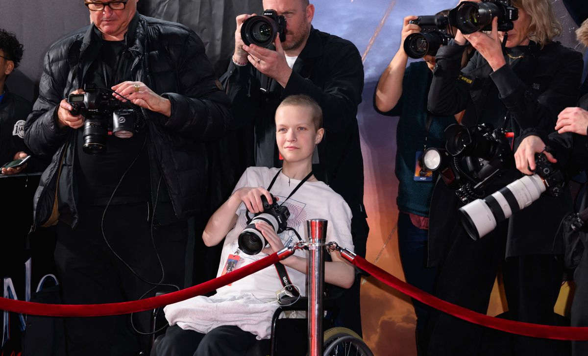 Liz Hatton (C) works alongside the press photographers during the UK Premiere of &quot;Venom: The Last Dance&quot; at the BFI IMAX Waterloo on October 23, 2024 in London, England