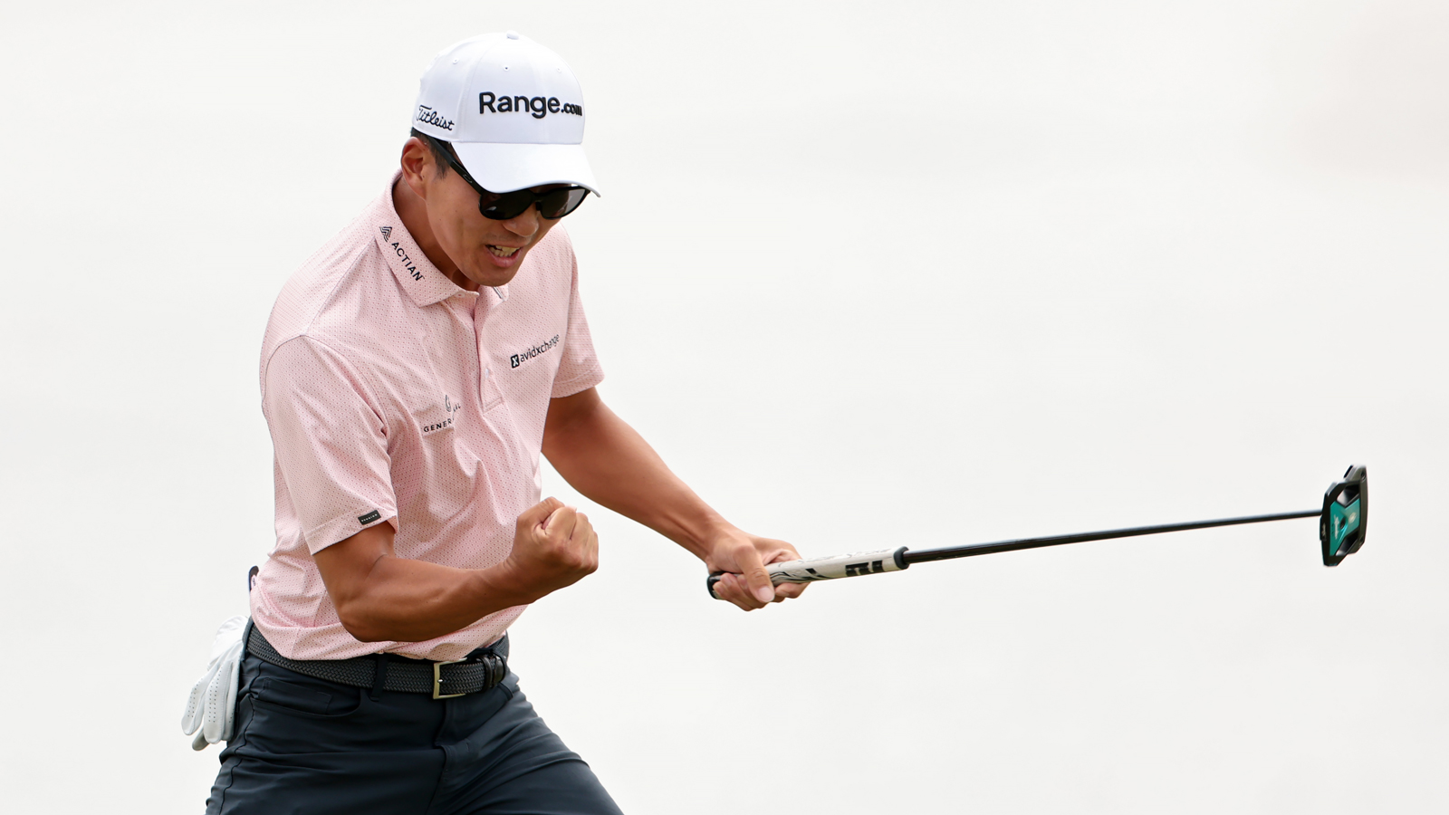 Michael Kim celebrates a holed putt