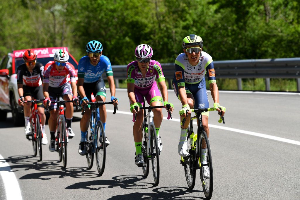 FOLIGNO ITALY MAY 17 Taco Van Der Hoorn of Netherlands and Team Intermarch Wanty Gobert Matriaux Umberto Marengo of Italy and Bardiani CSF Faizan Pro Team Samuele Rivi of Italy and EOLOKOMETA Cycling Team Simon Pellaud of Switzerland and Team Androni Giocattoli Sidermec Kobe Goossens of Belgium and Team Lotto Soudal in breakaway during the 104th Giro dItalia 2021 Stage 10 a 139km stage from LAquila to Foligno girodiitalia Giro on May 17 2021 in Foligno Italy Photo by Tim de WaeleGetty Images