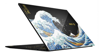 An MSI Prestige 13 AI+ Ukiyoe Edition with the Great Wave off Kanagawa on the lid