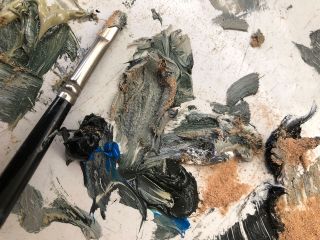 Chris Calle's artist palette showing the sawdust from an Apollo 14 moon tree being mixed into his oil paints