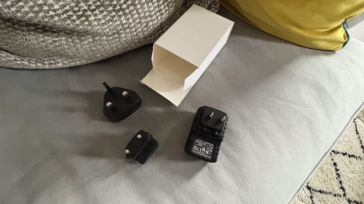 A white box with adapters and sockets for the LectroFan EVO White Noise Machine.