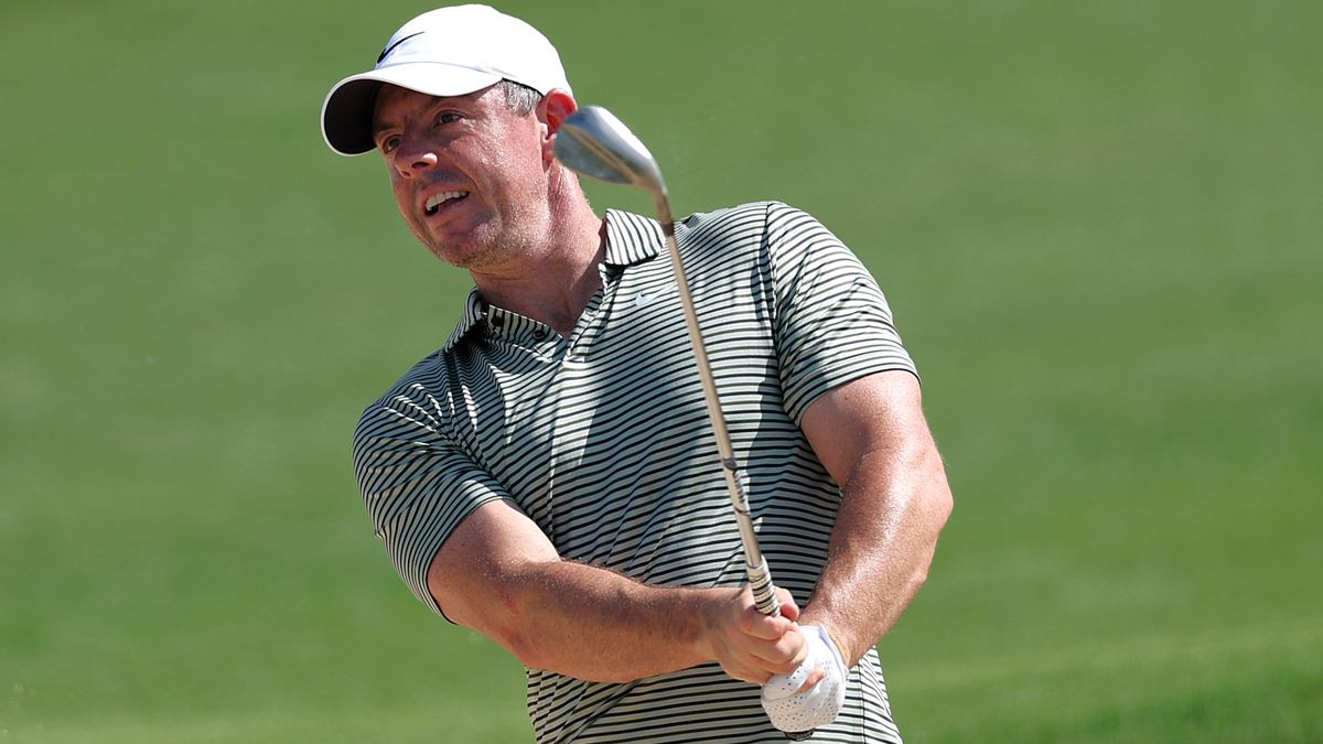 Rory McIlroy plays from a bunker at Yas Links ahead of the Abu Dhabi Championship 2024 live stream