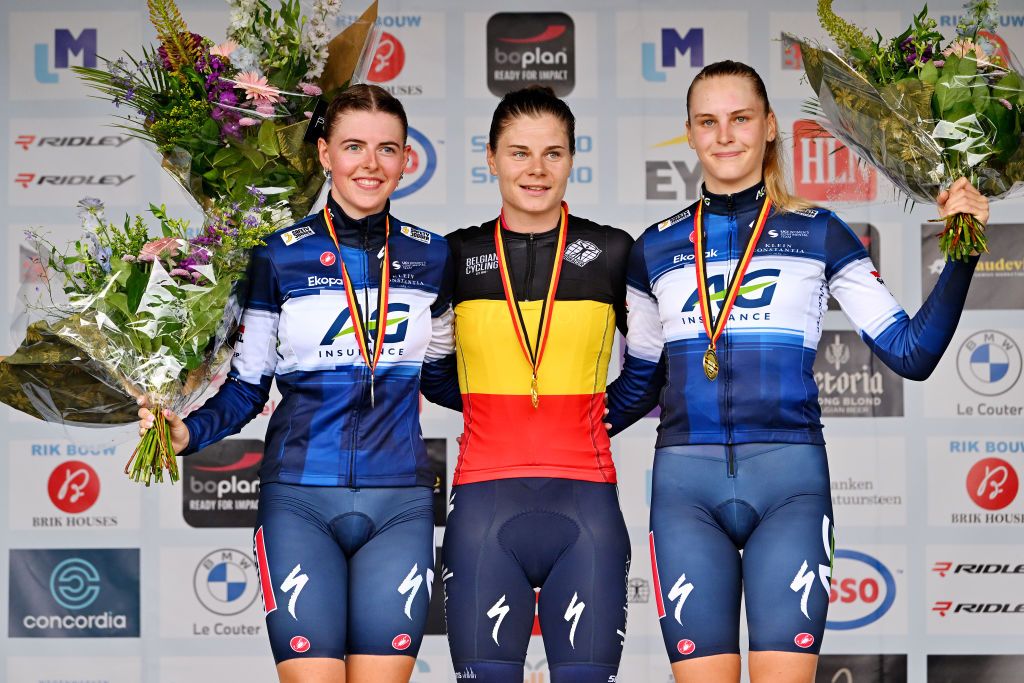 DIEST BELGIUM JUNE 22 LR Silver medalist Febe Jooris of Belgium gold medalist Lotte Kopecky of Belgium and bronze medalist Marthe Goossens of Belgium pose on the podium during the medal ceremony after the 104th National Championships Belgium 2023 Womens Individual Time Trial on June 22 2023 in Diest Belgium Photo by Luc ClaessenGetty Images