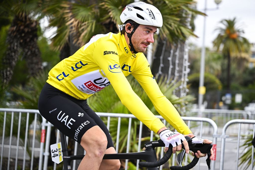 Race leader Brandon McNulty of UAE Team Emirates making his way to the stage in Nice