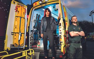 Davina McCall standing in back of ambulance as she prepares to present A & E Live, which is on Tuesday 22nd May