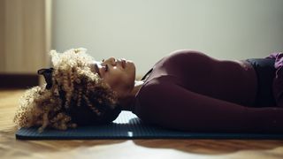 Woman asleep on the floor