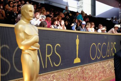 An Oscar statue at the Academy Awards red carpet.