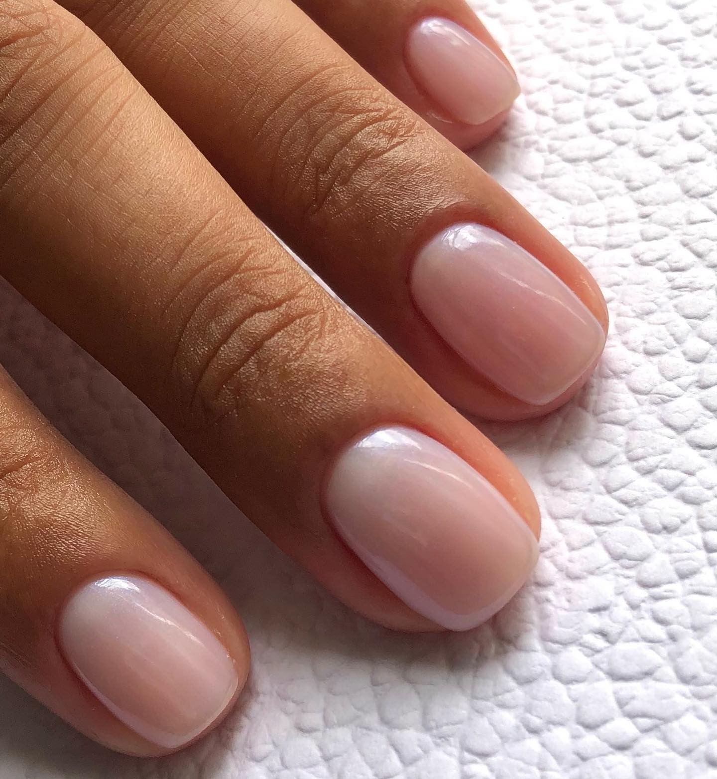 Iram Shelton wearing Nails Inc Glowing Somewhere Nail Polish