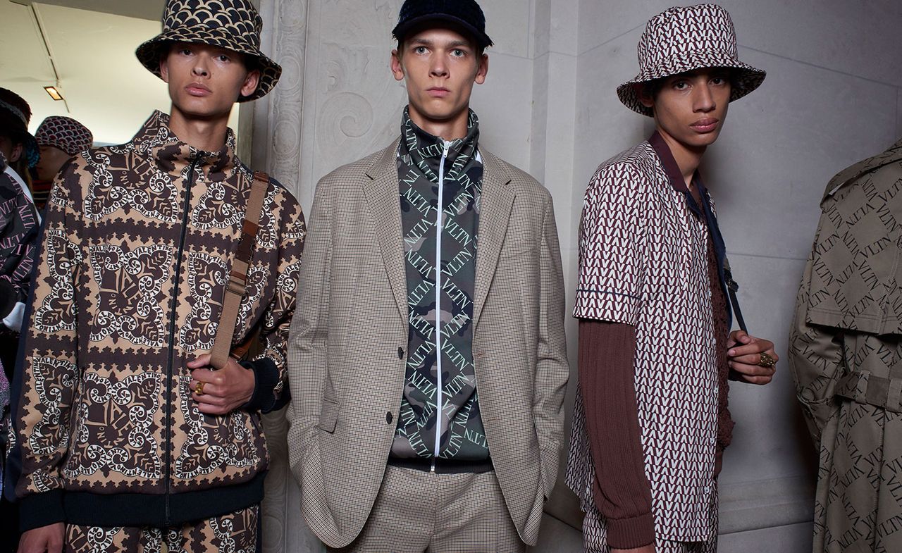 Models wear hats, jackets and pattered shirts at Valentino S/S 2019