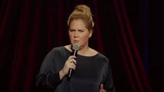 Amy Schumer doing stand-up comedy