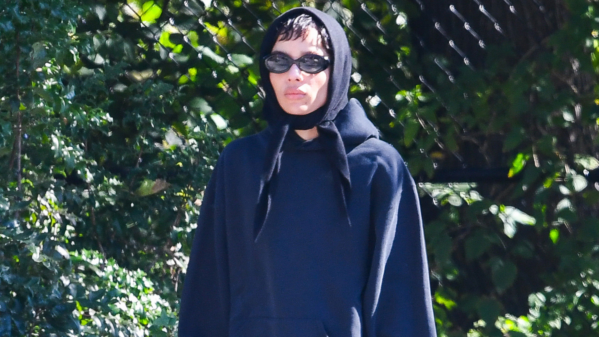 Zoë Kravitz was spotted in NYC wearing corduroy pants, a knit head scarf, and Vans sneakers