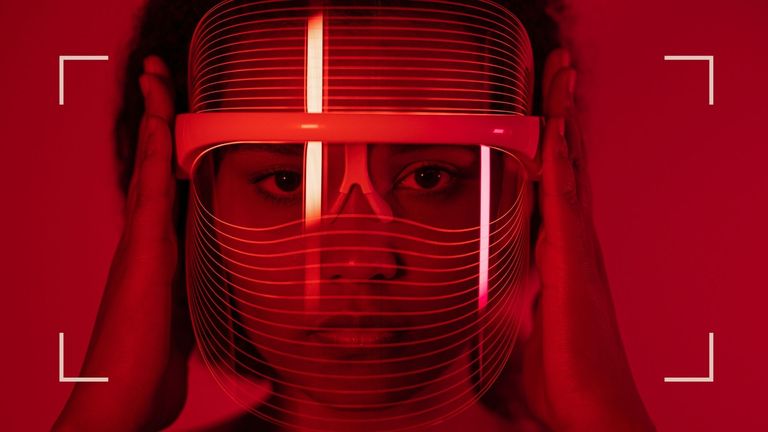 what is red light therapy - woman wearing LED mask