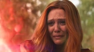 Wanda Maximoff (Elizabeth Olsen) crying while killing Vision in Avengers: Infinity War