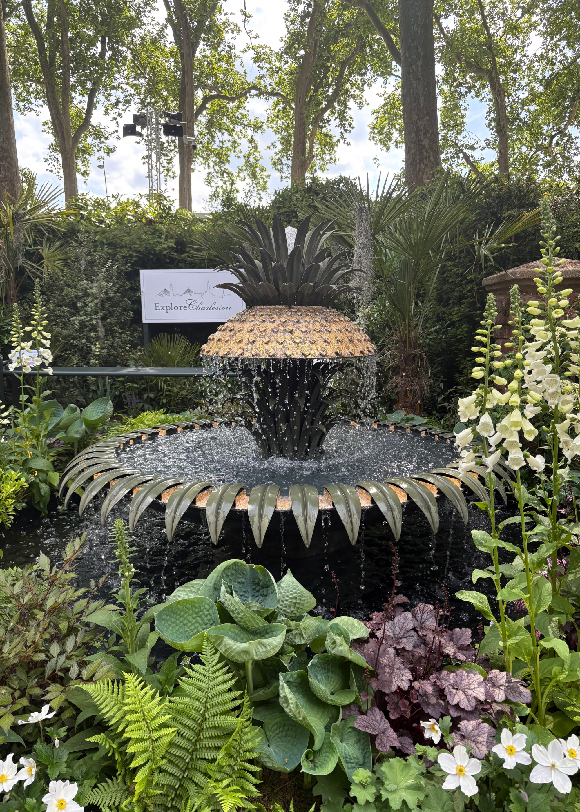 A pineapple fountain at Chelsea Flower Show 2025