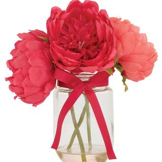 pink flowers in glass jar